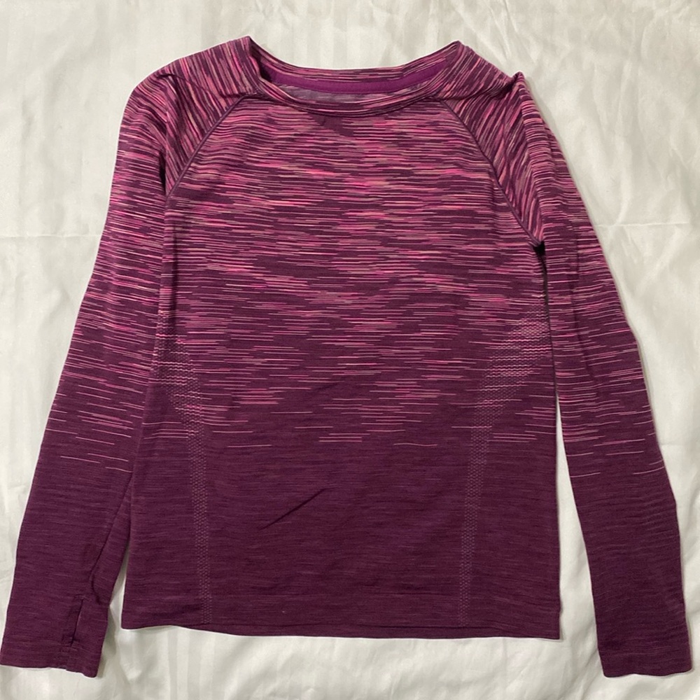 All in motion girls size medium (7/8) activewear long sleeve with thumb holes.